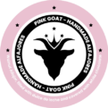 Image of the Pink Goat Handmade Alfajores logo, a brand specializing in handmade alfajores. The design features a black goat with a crown at the center, surrounded by a circular frame with text that includes the brand name and distinctive features of the alfajores, such as the dulce de leche filling and white chocolate coating.